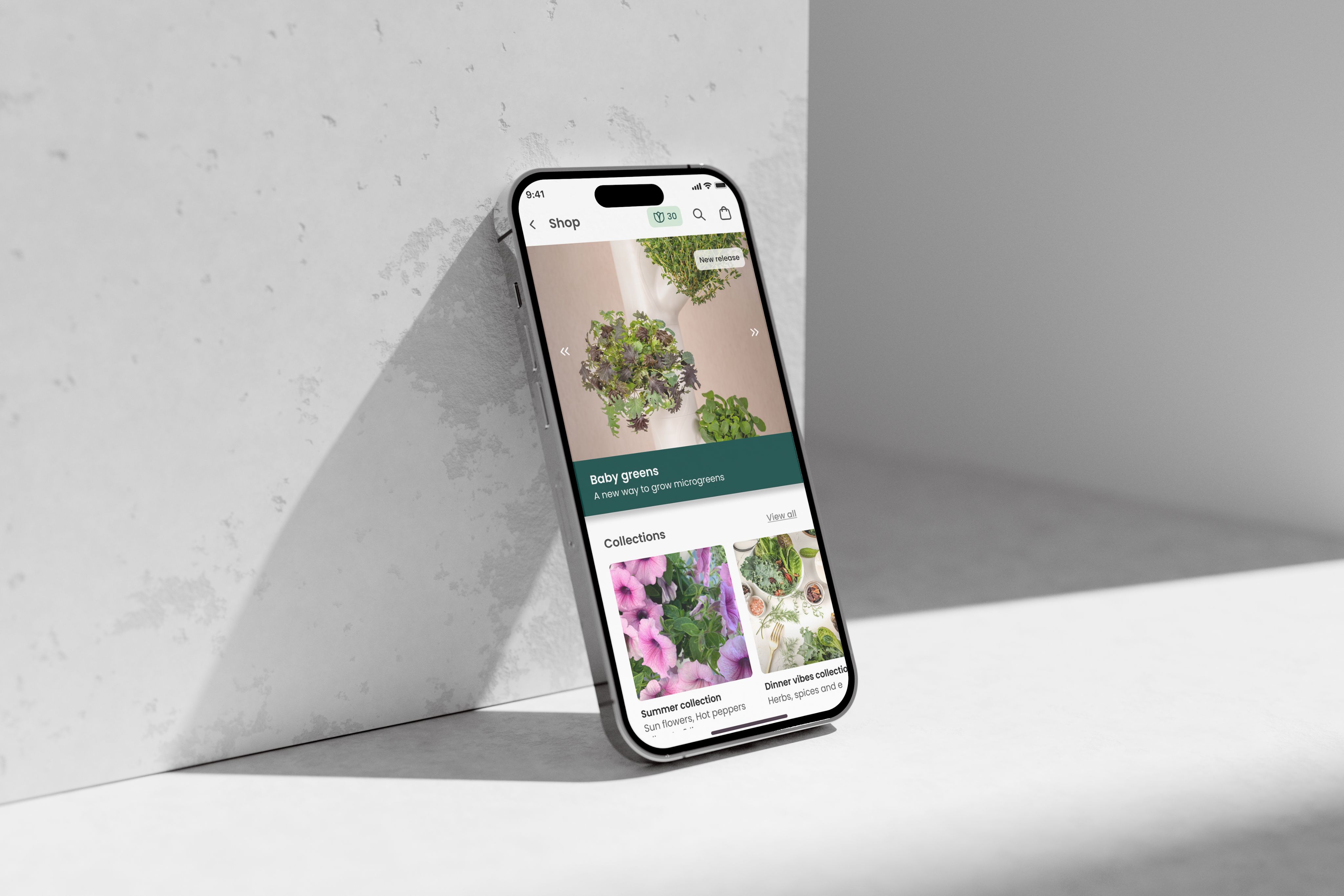 Gardyn shop home with collections and featured plants on a phone